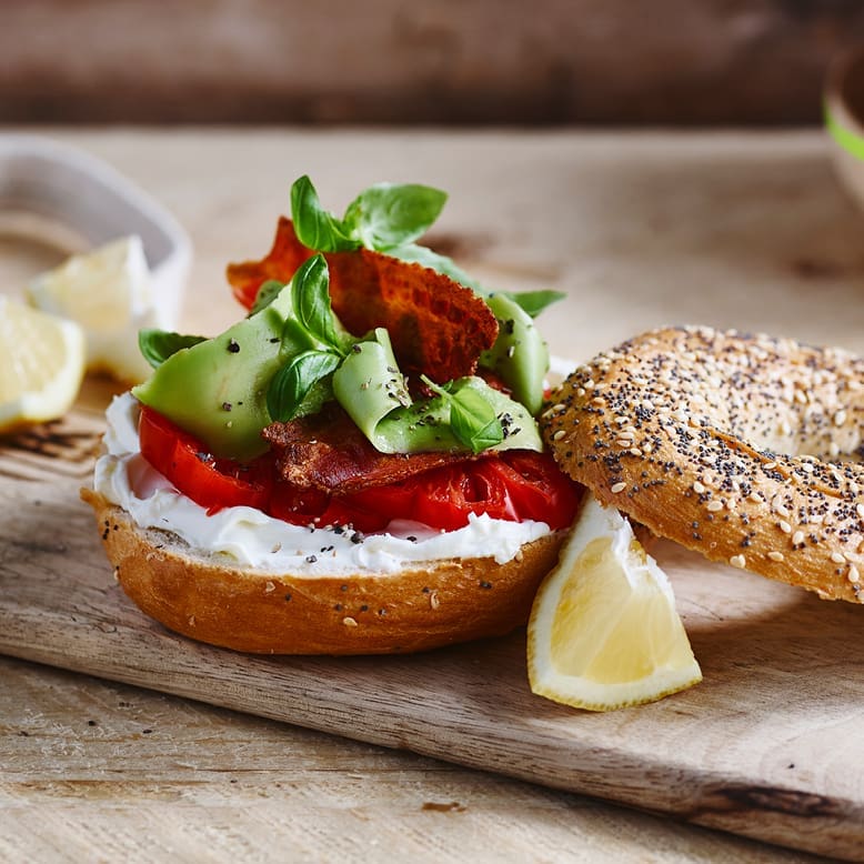 Bagel with avocado and bacon